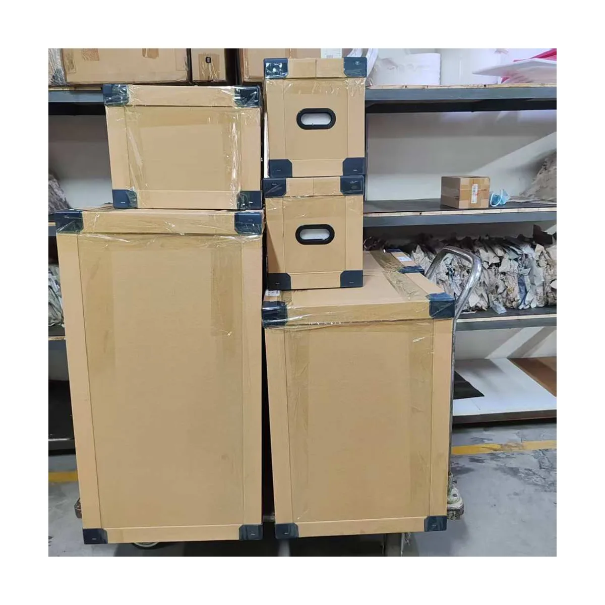 PHOENIX-7 porcelain furnace, packed in shipping cartons with corner protectors on a warehouse trolley