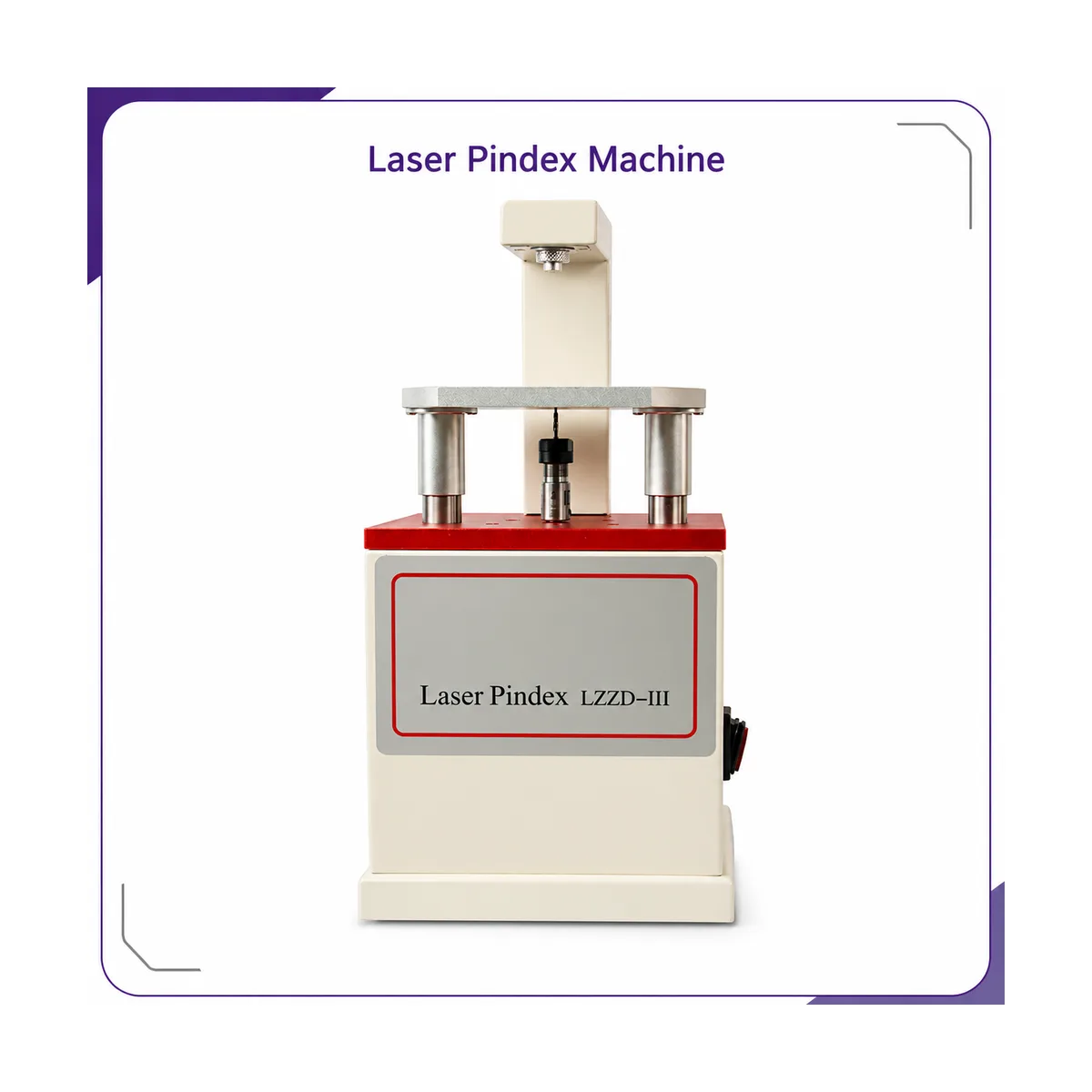 Front view of the cream-and-red pindex machine showing the spring-loaded worktable on twin columns, the drill below and the laser head above